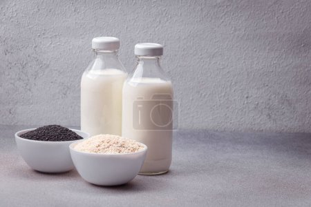 Photo for Alternative vegan milk based on sesame seeds. Nutritious eco drink - Royalty Free Image
