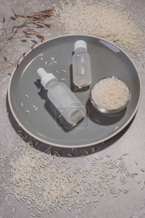 Photo for Home facial care. Cosmetics based on rice water. Serum, water with rice extract - Royalty Free Image