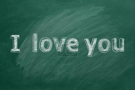 Photo for I love you. Inscription in chalk on the school blackboard. Valentines day. Love concept. - Royalty Free Image