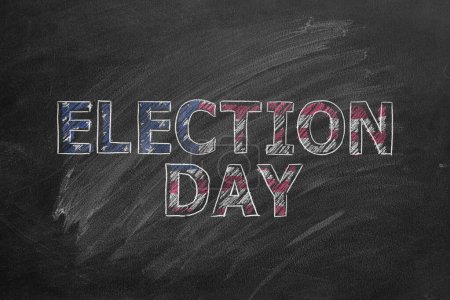 Photo for The inscription ELECTION DAY In the colors of the American flag is drawn with chalk on a blackboard. US Presidential election 2024. Election Day in United States - Royalty Free Image