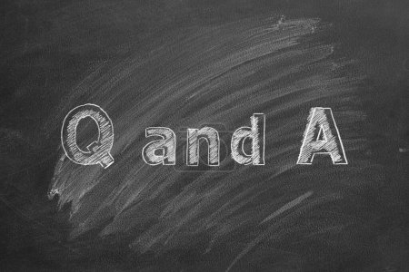 Photo for Hand drawing text Q and A on blackboard. - Royalty Free Image