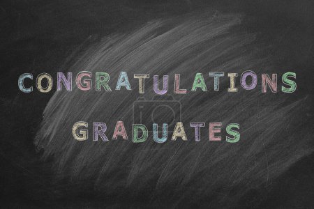 Photo for Hand drawing text CONGRATULATION GRADUATES on blackboard. - Royalty Free Image