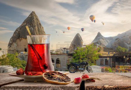Photo for View of Cappadocia and a cup of Turkish tea - Royalty Free Image