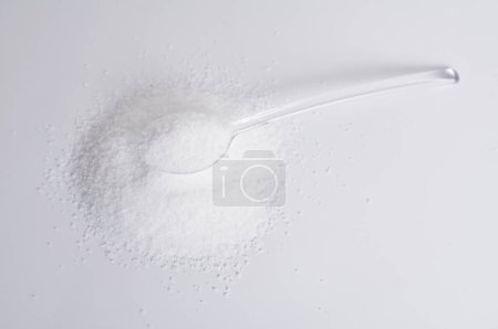 Photo for Stevioside powder. Natural sweetener on white background. - Royalty Free Image