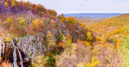 Fall colored deciduous oak autumn forest Appalachian landscape with Overall Run Falls in Shenandoah National Park, Virginia, VA, USA
