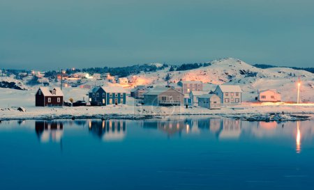 Photo for Calm winter evening in Durrell Harbour neighbourhood of outport town of Twillingate, Newfoundland, NL, Canada - Royalty Free Image