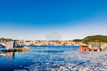 Beautiful winter day in outport town of Tizzards Harbour on New World Island, Newfoundland, NL, Canada