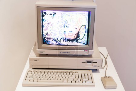 Photo for Venaria Reale, Italy - October 2022: Computer Commodore Amiga 1000 with floppy disk, mouse, beige - Royalty Free Image
