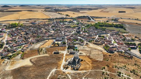 Photo for Aerial view of the small village of Mota del Marques in Valladolid province, as seen from over the ruins of its castle. - Royalty Free Image