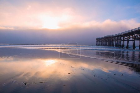 Photo for Foggy sunset at pacific beach - Royalty Free Image