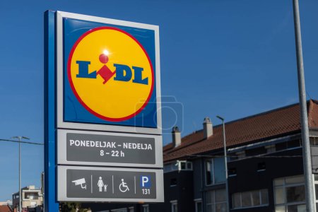 Photo for Valjevo, Serbia - March 24, 2023: LIDL supermarket chain sign on parking. LIDL is a German global discount supermarket chain, based in Neckarsulm, Baden-Wuerttemberg, Germany. - Royalty Free Image