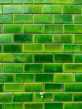 Photo for Green rectangular ceramic tiles wall backgound. - Royalty Free Image