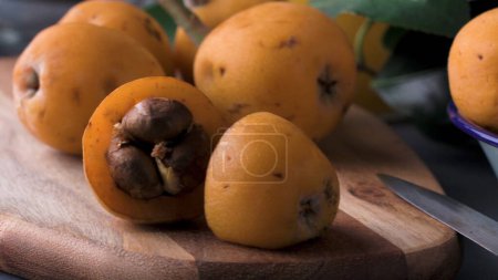 Photo for Loquats on kitchen counter background. - Royalty Free Image