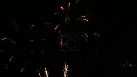 Photo for Beautiful fireworks show on a dark night sky. - Royalty Free Image