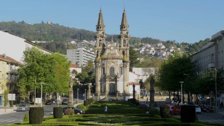 Photo for GUIMARAES, PORTUGAL - CIRCA APRIL 2018: Church of Nossa Senhora da Oliveira in Guimaraes. The city was settled in the 9th century at which time it was called Vimaranes. - Royalty Free Image