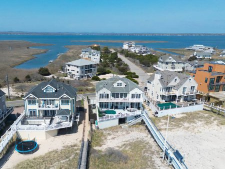 view of luxury homes along the beach in the Hamptons Long Island New York