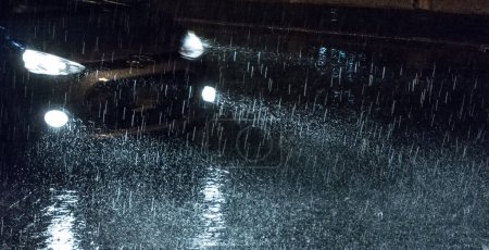 Photo for Mystical movement on a rainy night - Royalty Free Image