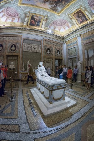Photo for Rome, Italy - Oct 05, 2018: Tourists admire the sculpture in the Borghese Gallery, Rome - Royalty Free Image