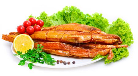 Photo for Appetizing smoked fish on a platter - Royalty Free Image