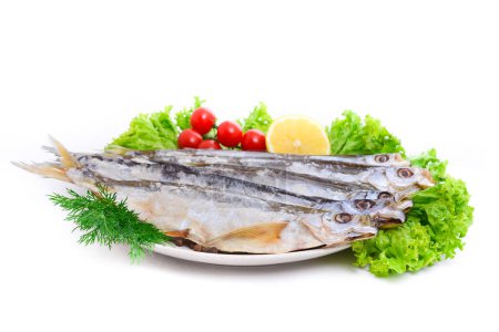 Foto de Grupo de pescado seco en el plato. Mariscos - Imagen libre de derechos