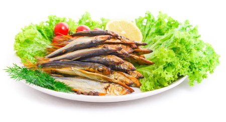 Photo for Dried smoked capelin on a plate - Royalty Free Image