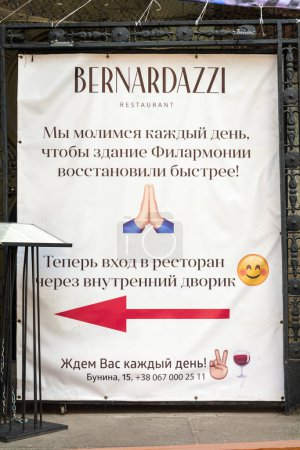 Téléchargez les photos : Odessa, Ukraine - APR 29, 2019: Every day we pray that the Philharmonic will be restored faster, advertising poster in Odessa, Ukraine - en image libre de droit