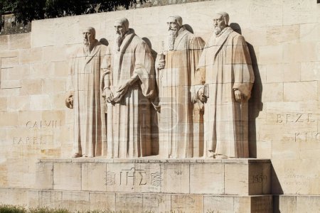 Photo for Reformation Wall in the Bastions Parc. Monument statues of the calvinistes are William Farel, John Calvin, Theodore de Beze and John Knox. Geneva, Switzerland. - Royalty Free Image