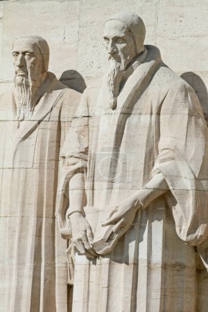 Photo for Fragment of the sculptural composition Reformation Wall in the Bastions Parc, Geneva, Switzerland. Monument statues of the calvinistes are William Farel and John Calvin in Geneva, Switzerland. - Royalty Free Image