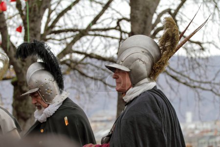 Photo for GENEVA; SWITZERLAND -DEC 10: Medieval horse riders in authentic military armor participant in the Escalade feast December 10, 2023 in Geneva, Switzerland. - Royalty Free Image