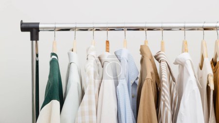 Clothes rack with minimal wardrobe.