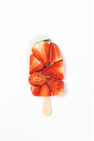 Photo for Close up of strawberry ice cream on stick. White background. - Royalty Free Image