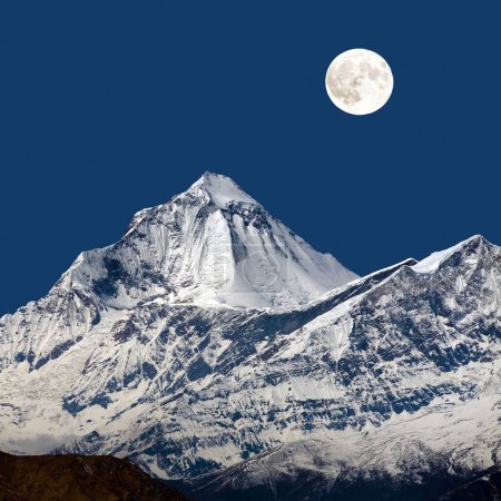 Photo for Mount Dhaulagiri from Thorung la pass, night view with moon, Nepal Himalaya mountain - Royalty Free Image