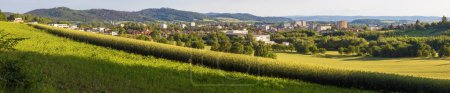 Photo for Town of Sumperk and grain field, Panoramic view from Jesenik mountains, Moravia, Czech Republic - Royalty Free Image