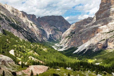 Valley Val Travenanzes and path way rock face in Tofane gruppe, Alps Dolomites mountains, Fanes national park, Italy