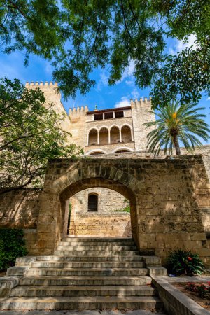 Photo for Royal Palace of La Almudaina next to cathedral La Seu. One of the official residences of the Spanish royal family. City Palma de Mallorca. Balearic Islands Spain. Travel agency vacation concept. - Royalty Free Image