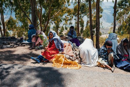 Photo for DEBRE LIBANOS, ETHIOPIA - APRIL 19, 2019: Unidentified Ethiopian people sell street market near Debre Libanos Cathedral on April 19. 2019 in Debre Libanos, Oromia Region Ethiopia - Royalty Free Image