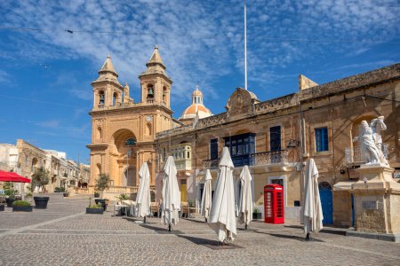 Beautiful Parish Church of Our Lady of Pompei, a prominent church with intricate architecture, overlooking the picturesque Marsaxlokk fishing village. Cultural heritage of Malta