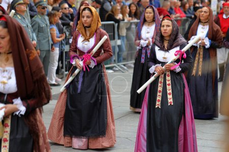 Photo for CAGLIARI, Italy - May 1, 2023: Festival of Sant'Efisio in Cagliari, Sardinia. Group of women and men all wearing the traditional costumes of their village - Royalty Free Image