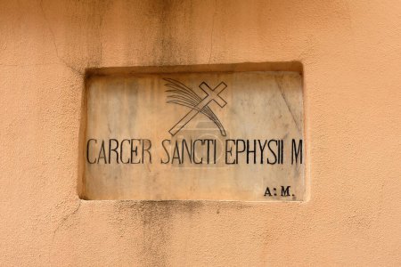 Photo for CAGLIARI, Italy - May 1, 2023: Festival of Sant'Efisio in Cagliari, Sardinia. Latin inscription over the entrance to the prison where Sant'Efisio was martyre - Royalty Free Image