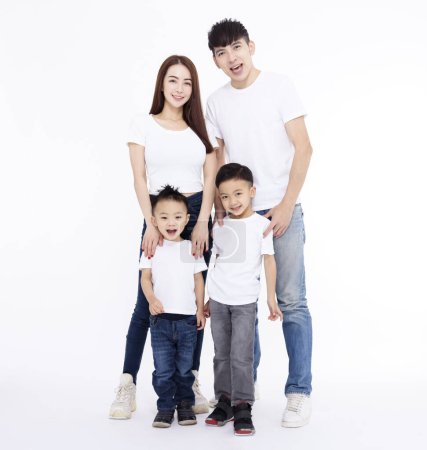 Photo for Happy Asian family standing together on white background - Royalty Free Image