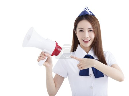 Photo for Beautiful Airline stewardess holding and pointing to the megaphone - Royalty Free Image
