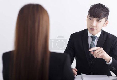 Photo for Business manager interviewing young women job applicant in the office - Royalty Free Image
