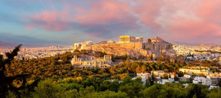 Photo for Panoramic view of The Acropolis of Athens, Greece, with the Parthenon Temple with colorful clouds at  sunset time. Athens, Greece, Europe - Royalty Free Image
