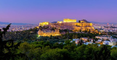 Photo for Greece - The Acropolis of Athens, Greece, with the Parthenon Temple with lights during sunset. Athens, Greece, European turism - Royalty Free Image