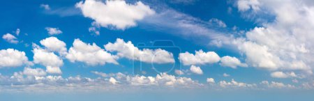 Photo for Panorama of real blue sky during daytime with white light clouds Freedom and peace. Large photo format Cloudscape blue sky - Royalty Free Image