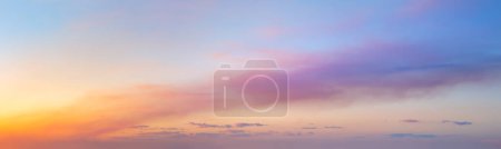 Photo for Majestic real sky - Pastel colors - Panoramic Sunrise Sundown Sanset Sky with colorful clouds. Without any birds.  Natural Cloudscape. Large panorama - Royalty Free Image