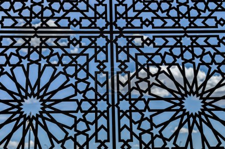 Silhouette of a metal structure against the sky.Metal Construction against blue sky background
