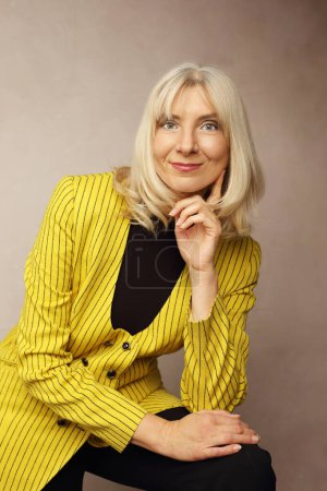 Beautiful blond lady in her 50s professional portrai personal branding shot