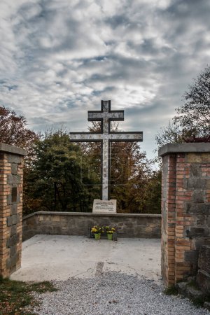 Photo for Swiety Krzyz, Poland, October 16, 2022: The Plague Cross in memory of the 2019 world pandemic Covid erected in the Holy Cross Sanctuary in Poland. - Royalty Free Image