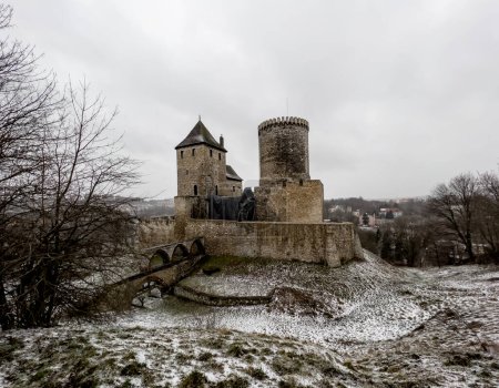 Castle in Bedzin, Silesia, Poland, in March snowy weather.